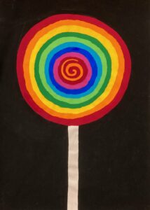 Bild eines farbigen Lollipop mit schwarzem Hintergrund - Maltherapie